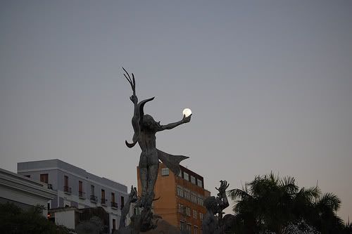 statue-holding-moon-illusion.jpg
