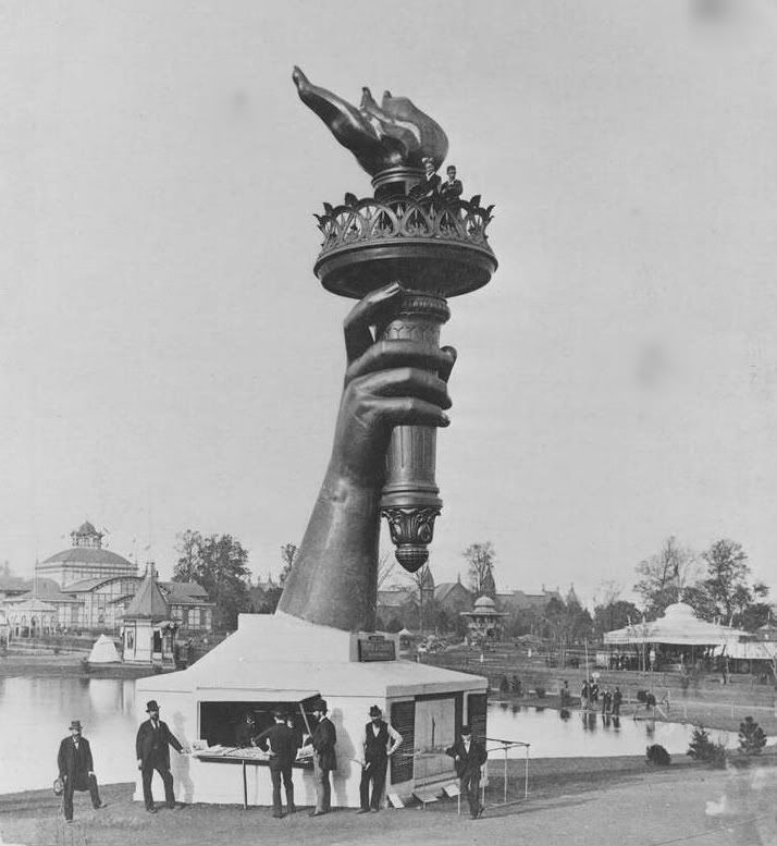 the statue of liberty torch. The torch and part of the arm