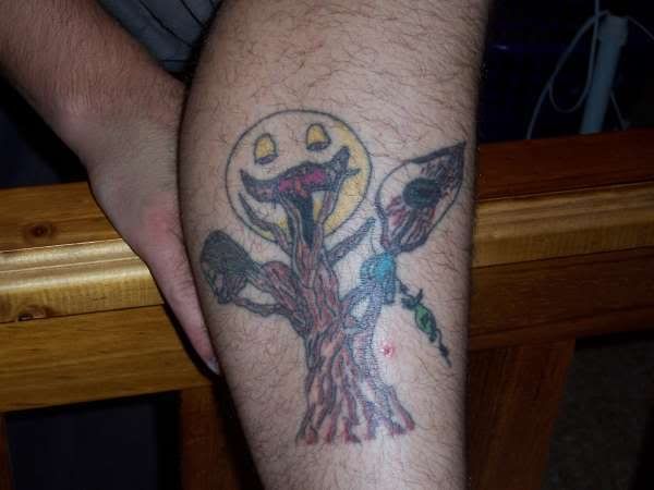 The .jpg is named "trippy tree tattoo", and I can make out the tree trunk, 
