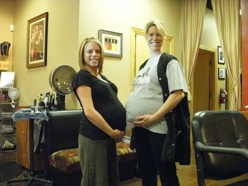 Kim and I 9 months pregnant