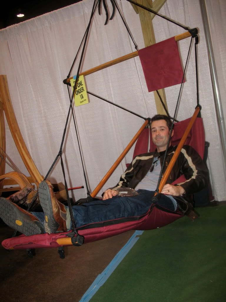 My Husband, Pete, in a cool hanging lounge chair! (Complete with beverage holder!)